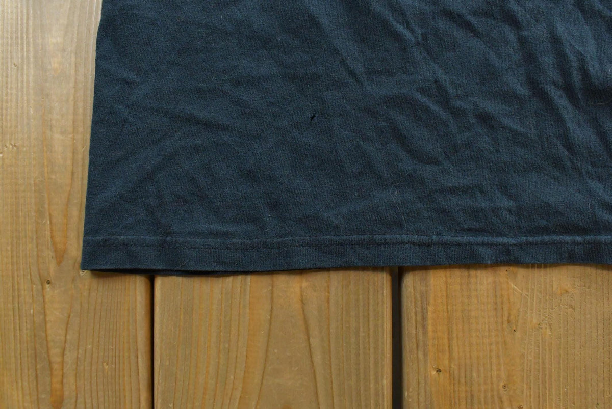 Vintage Y2K Wes Benscoter Skull Cave T-Shirt Mens S from propervintagecanada
