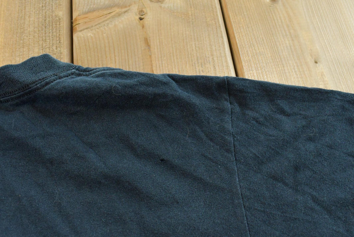 Vintage Y2K Wes Benscoter Skull Cave T-Shirt Mens S from propervintagecanada