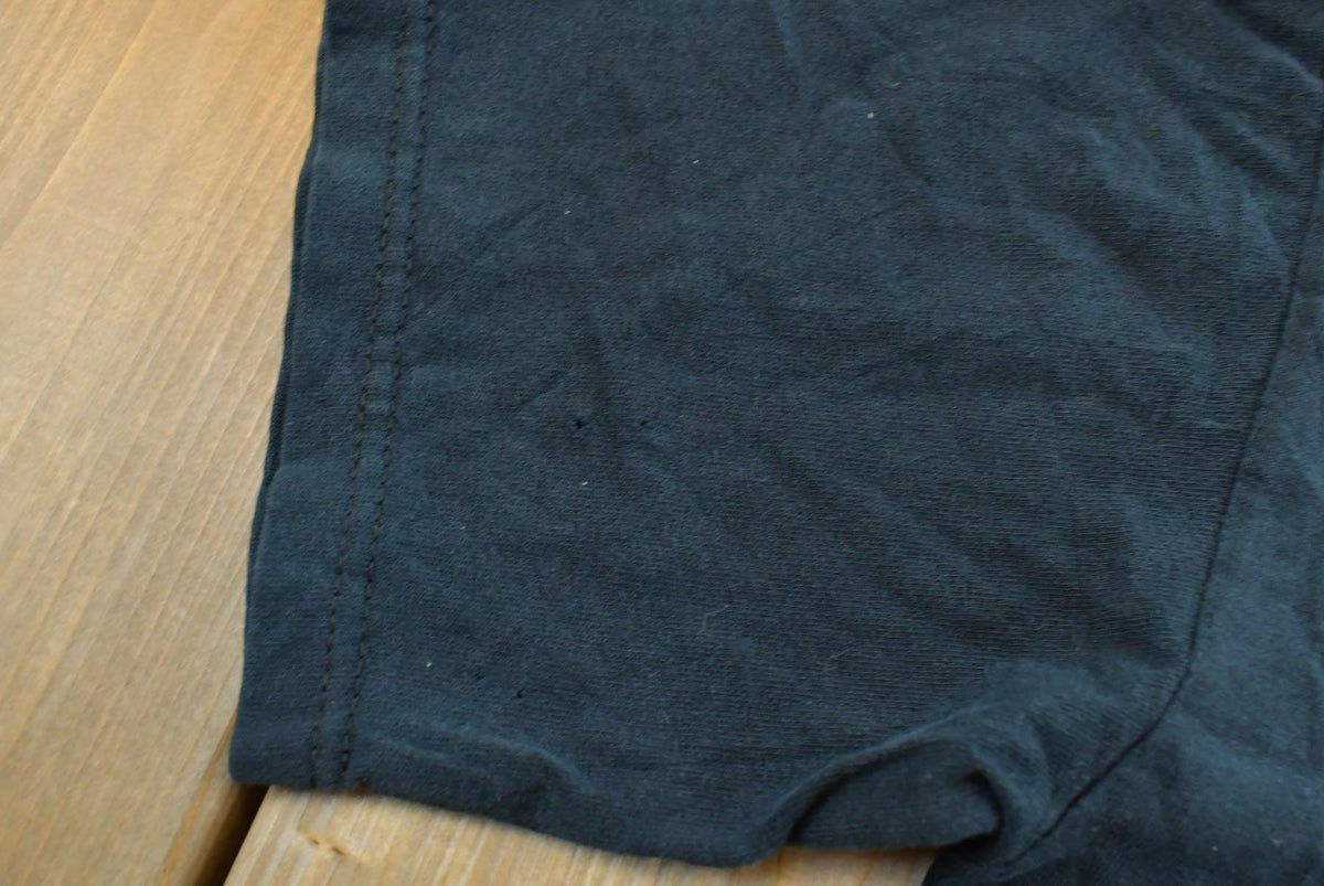Vintage Y2K Wes Benscoter Skull Cave T-Shirt Mens S from propervintagecanada